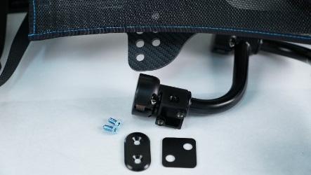 16 1. Using a 4-mm hex key, remove the two (2) button head socket cap screws from the torso plate s (oval) front