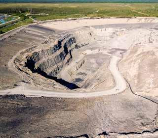 The mine developed a 15-million- Canadian-dollar network of dedicated drift and ore passes and waste passes fitted with automatically controlled chutes, and built a new mine operations control centre
