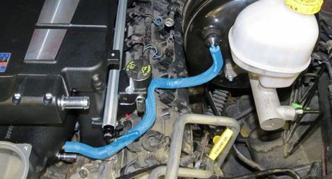 61. Install the brake booster hose to the