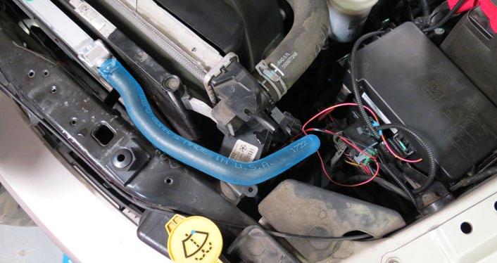 Using a 3/4 hose clamp from Bag #2, secure the Manifold to LTR hose to