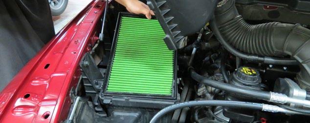 98. Remove the lid from the airbox and replace the factory air filter with the supplied green filter. Reinstall the airbox lid. 102.