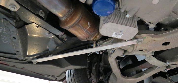 Carefully remove the sway bar assembly and set