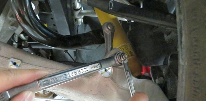 Using a Torx T15, remove four (4) bolts