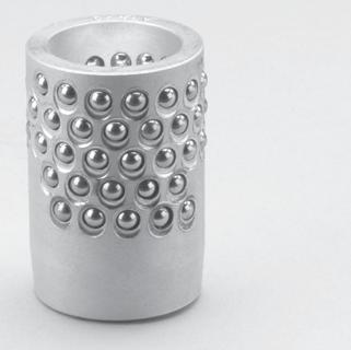 The ball bearings are arranged in the cage in a spiral pattern to minimize tracking or grooving and assure uniform wear.