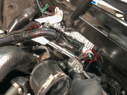 the engine compartment, similar to the boost pressure sensor 1.