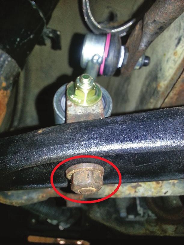 7. Reattach the stabilizer bar end link to the lower control arm (Fig. 26). Torque to 22Nm (16 lb.-ft.). fig. 26 8. Fully compress the suspension using a jack.