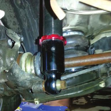 Install, but do not torque the lower shock eye bolt at this time