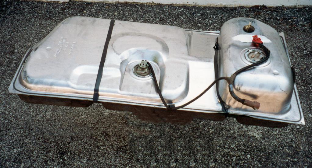 Using the above steel braided hose assembly, connect one end to the outlet of the fuel tank sump and the other end to the fuel pump / filter assembly inlet and tighten. See figure 1-5.