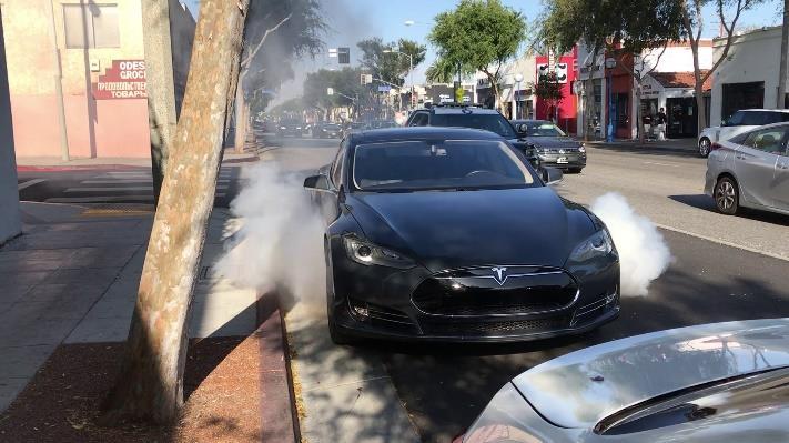 called Tesla Fire fighters put out flames quickly, smoke