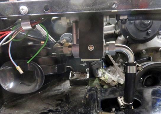 MAKING BRACKETS FOR MOUNTING THE 4-POINT HARNESSES The oil thermostat firmly