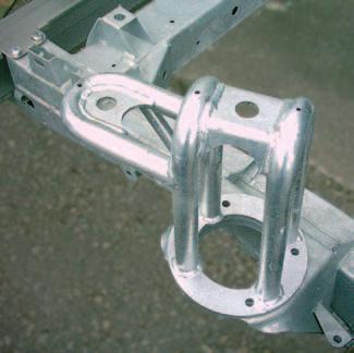 The rear unit consists of top shock absorber brackets which bolt through the chassis and bottom brackets which weld onto the axle case.