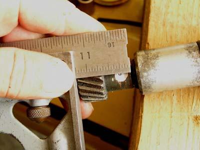 Used small grinder and file to cut each end of the pin to where it was very slightly below the surface of the gear. This allowed a faint outline of the pin to be seen. (Fig. 9A) B.