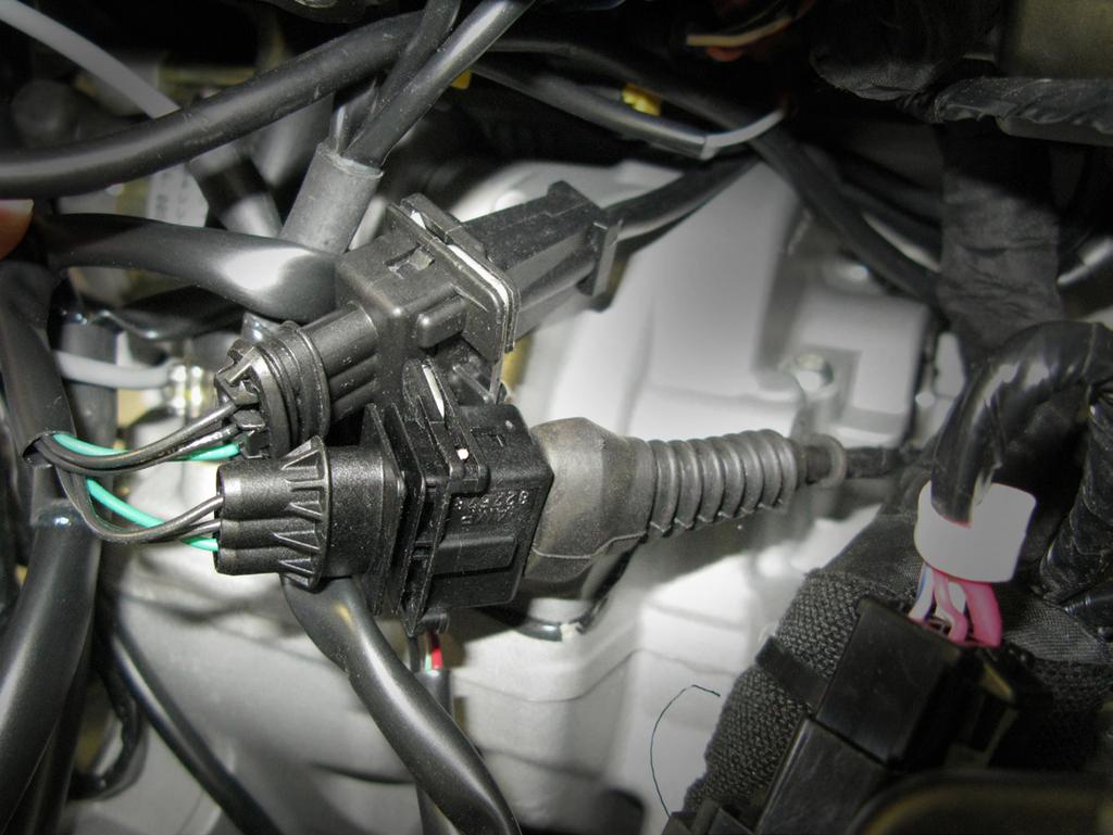 5>CONNECT (CONT.) 5.4 1. Locate the factory Crank Position Sensor (CKPS) connectors, found in the center of the engine compartment.