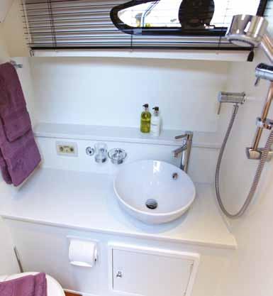 hooks. Two flush-fit overhead escape hatches allow plenty of natural light and air flow into the cabin. Mirror and coat hook fitted to the aft bulkheads.