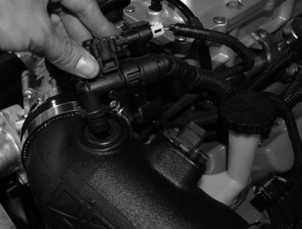 Install the intake tube and position
