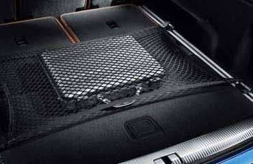 Can only be used in the 7-seater when the rear seats are folded down. 03 Luggage compartment net Protects luggage against slipping.