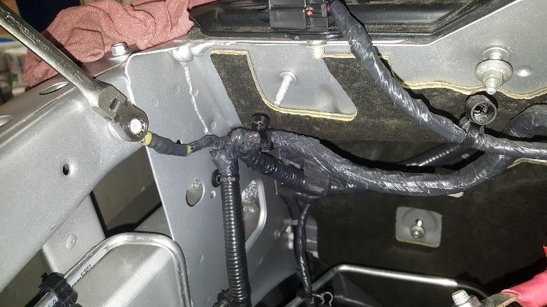 Install the ½ to 3/8 (1604053) hose mender to the coolant line running to the radiator.