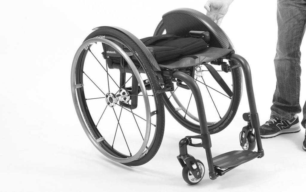 2) Unfold the wheelchair by pulling the drive wheel to the side (see fig. 7).