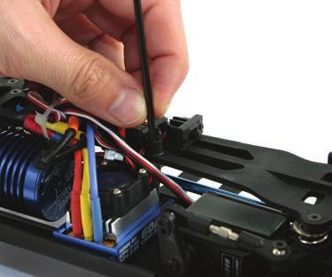 To install a charged battery, remove the body clips and remove the bodyshell.