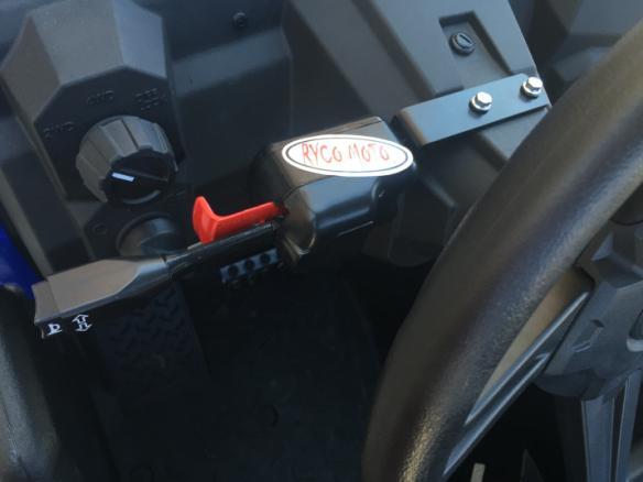 1. Insure the ignition key is in the off position and the key removed. 2. Remove the push pins and fasteners to allow the front cover to be opened. 3.