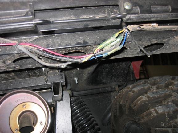 . 32. Unplug the yellow wires that lead to the two taillight assemblies. Plug the right side yellow wire into the factory yellow wires going to the taillight assembly.