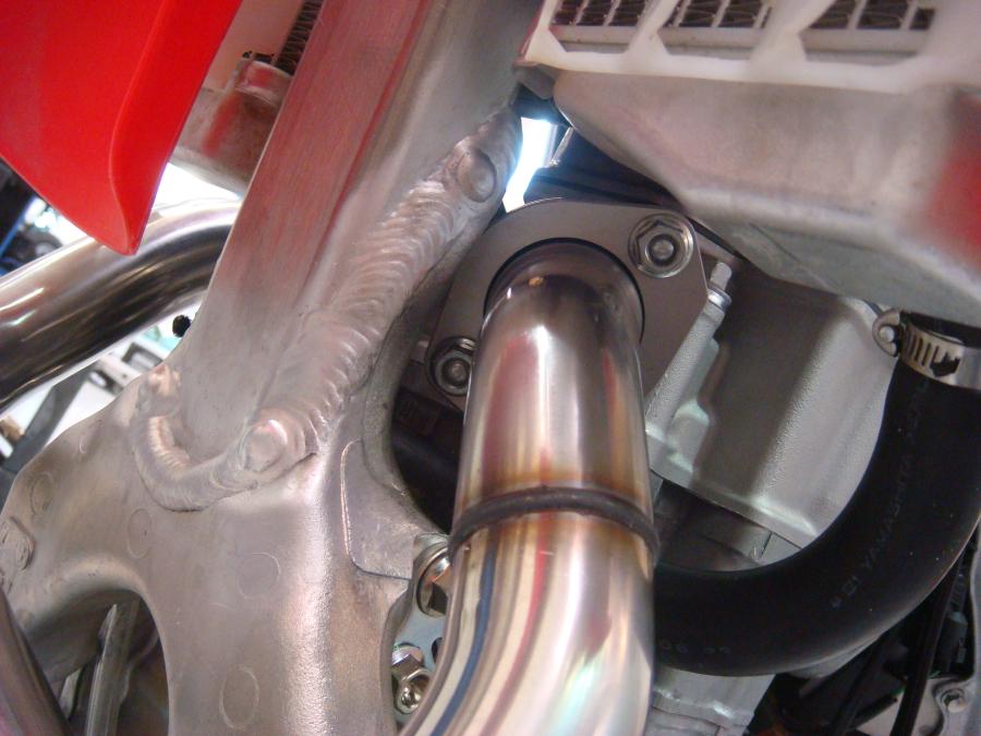 Installation Procedures: Page 2 Caution: Exhaust system can be extremely hot. Let motorcycle cool down before beginning installation.
