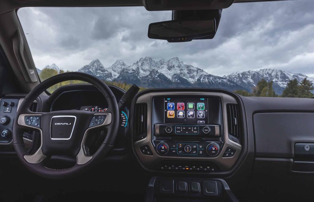 THIS COCKPIT PERFORMS LIKE A CONTROL TOWER GMC INFOTAINMENT SYSTEM 1 REAR VISION CAMERA 2 CUSTOMIZABLE DRIVER DISPLAY, EXCLUSIVE TO DENALI CENTER CONSOLE WIRELESS CHARGING MAT 3 IS AVAILABLE VOICE