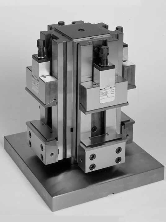 odular Vertical lamping System VS- Vertical clamping system complete with: 4 clamping equipment 1 column 1 base for vertical system 4 pair of AK parallels 4 covers for protection for the screws 4