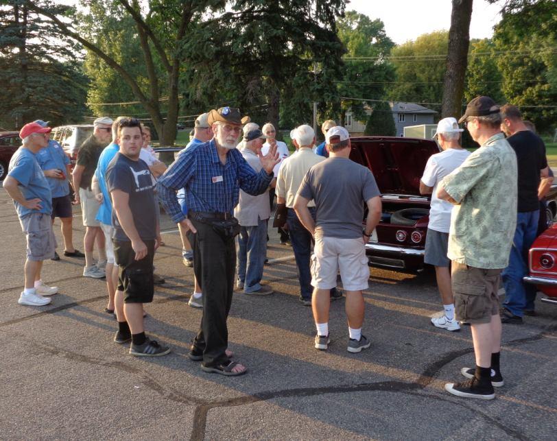 Jim Becker led off the parking lot tech session by going back to basics : the importance of engine shrouding and body plugs, clean your oil cooler, etc. It was a good review for everyone.