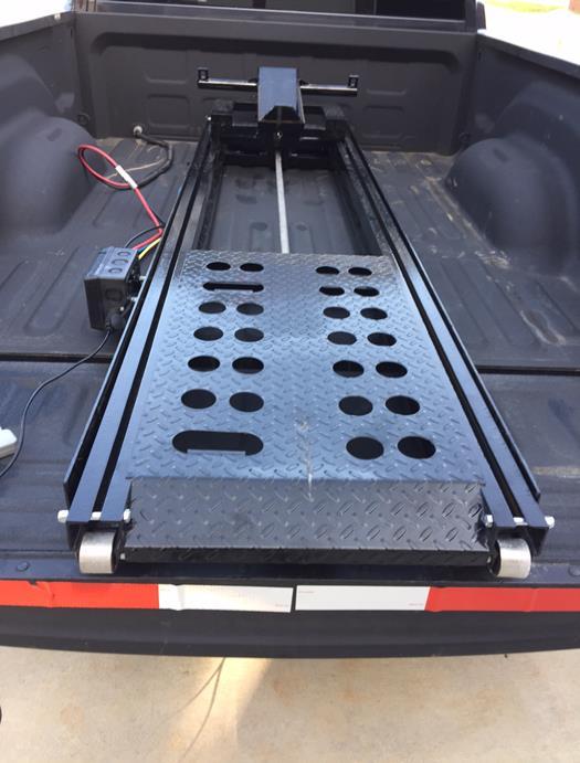 com website: The Rampage Power Lift Ramp is the fast, easy, and safe way to load a motorcycle into a truck.