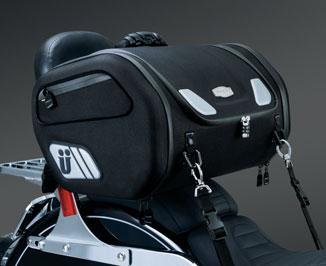 opening for main compartment can accommodate a full-face helmet Fits: Mounts on Tour Pak Luggage