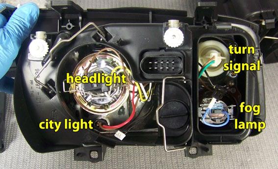 Then push the light socket into the hole in the headlight assembly, turning it clockwise to lock it in place. Step 17.