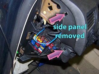 This opens up the side of the dash, making it easier to fish the wire. Step 20. Inside the car: Route the wire to the light switch opening.