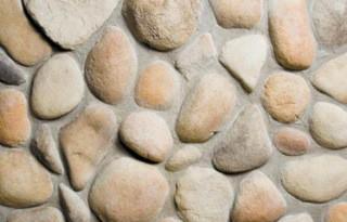 Style: River Rock (Color shown is Sienna) Round river stone with smooth texture.