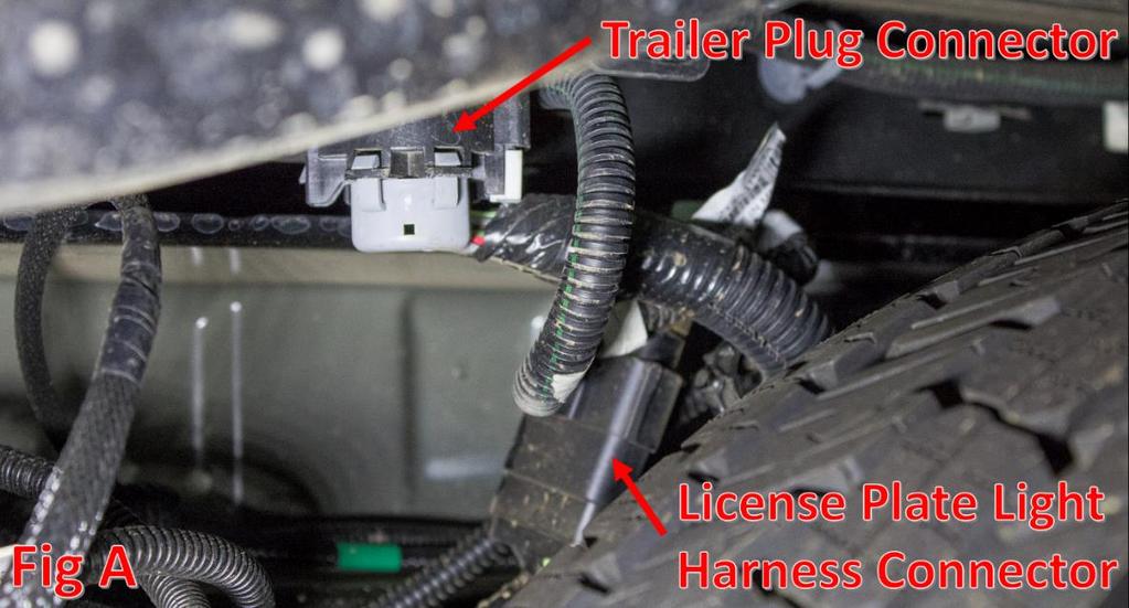 3. Remove the 13mm bolt that is directly behind the trailer