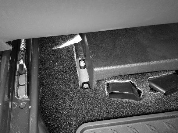 Remove the four 18mm bolts securing the driver s side rear seat and remove the seat from the