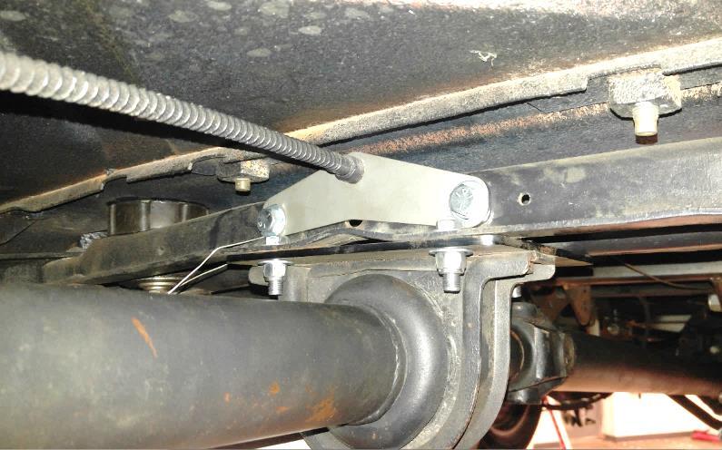 Install brake line mount (#3) to the front side of cross-member