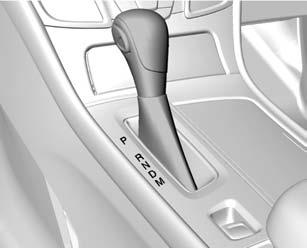 186 Driving and Operating Automatic Transmission Shift Lever without Selective Ride Control Shown P : This position locks the front wheels.