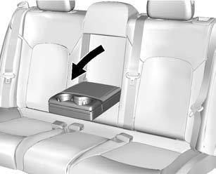 To raise a seatback: 1. Lift the seatback up and push it rearward to lock it in place. Make sure the safety belt is not twisted or caught in the seatback.