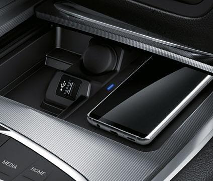Comprises Enhanced Bluetooth with wireless charging, Head-up Display, Loudspeaker system harman/kardon and WiFi hotspot preparation 1.