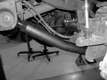 14. With the front axle well supported, remove the driver's and passenger s side lower control arm mounting bolts and remove the control arms from the vehicle.