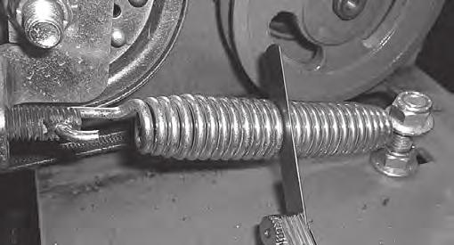 Tightening the two ¾ jam nuts on the right side will increase the belt