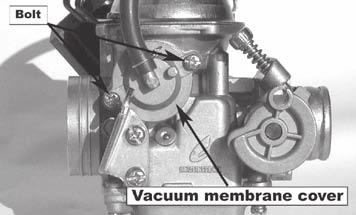 The bottom side of the vacuum membrane should be aligned with the carburetor. The top side should be aligned with vacuum membrane.