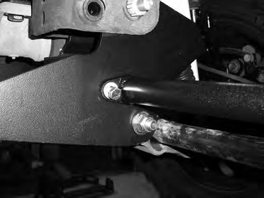 Figure 28 51. Position the back end of the compression strut up to the transmission crossmember.