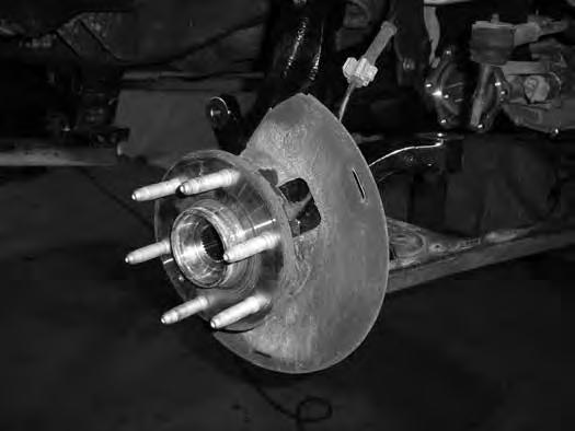 Apply Loctite to the bolt threads and torque to 133 ft-lbs. Figure 33 57. Install the brake rotor on the hub. Install the brake calipers on the knuckles with the original bolts.