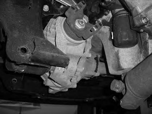 Disconnect the axle breather tube from the driver's side of the differential. 30. Loosen but do not remove all of the front differential mounting bolts.