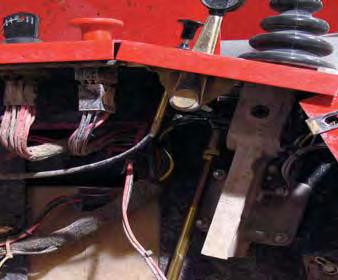 Place the upper linkage rod on the bolt with