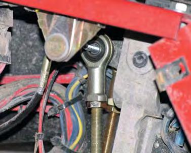 Place the upper linkage on the bolt with