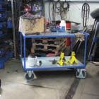 Table trolleys with pan Table trolleys with pan Welded steel construction; Screwed; Oil-tight pans and edge = 40 mm high; Trolleys powder-coated RAL 5010 gentian blue; Permanent surface protection;