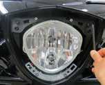 Disconnect headlight wires and remove the